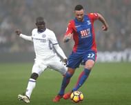LONDON, ENGLAND - DECEMBER 17: N'Golo Kante of Chelsea (L) puts pressure on Damien Delaney of Crystal Palace (R) during the Premier League match between Crystal Palace and Chelsea at Selhurst Park on December 17, 2016 in London, England.  (Photo by Clive Rose/Getty Images)